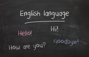 Blackboard with simple English phrases